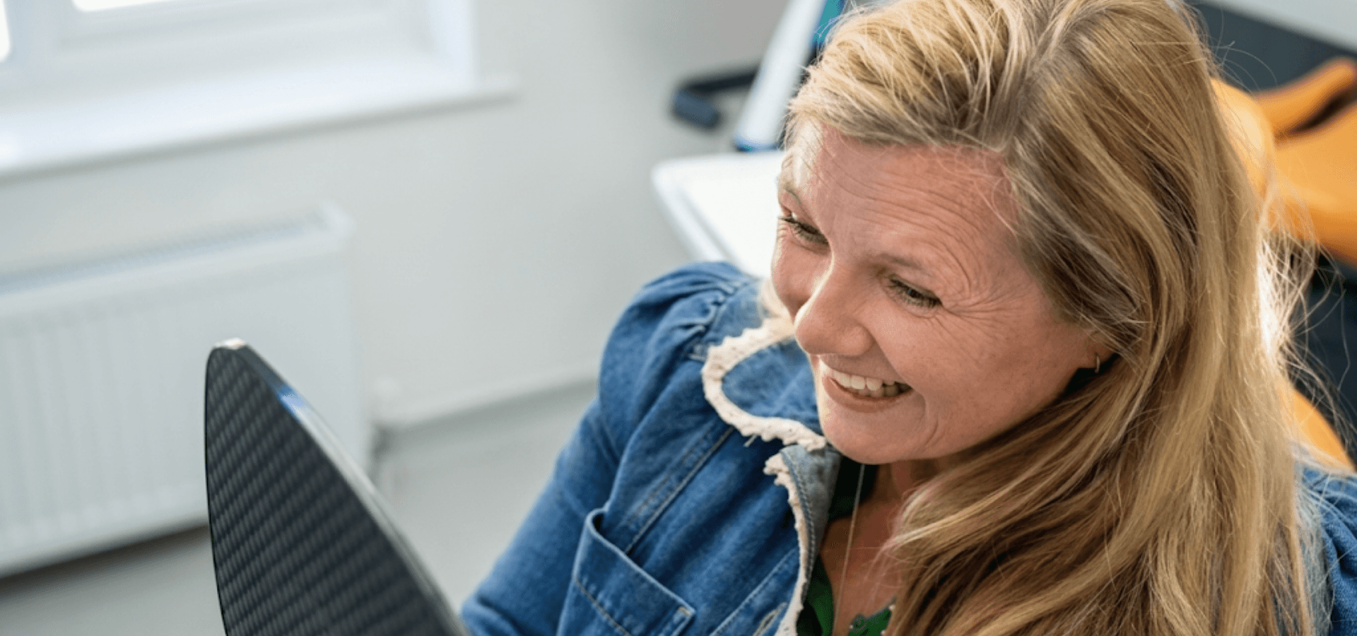 Smiling patient in the dental chair